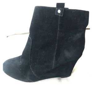 Black suede ankle bootie with wedge heel